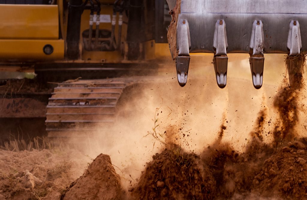 crush injuries at work - loading shovel bucket